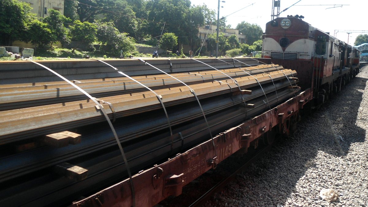 Twin diesel locomotives pulling a freight train on Indian Railways